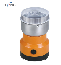 Electric coffee grinder with lid