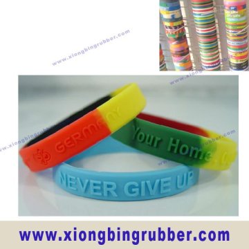 Segmented embossed silicone band