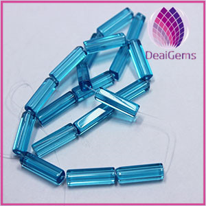 Bead glass blue 20x5mm cube approximately 20ps/strand.