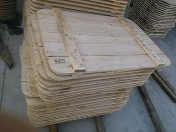 Graphite scraps wooden pallets