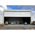 Quick action high speed hangar door