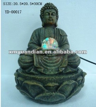 bodhisattva sitting on lotus pool fountain