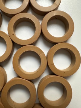 Rulon J gold-colored PTFE-based material guide