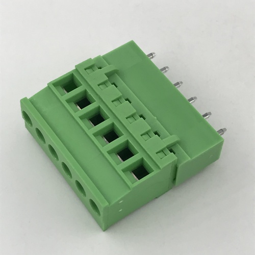 Vertical straight pin connector beside sealed terminal block