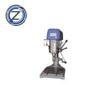 Overload protection tapping machine