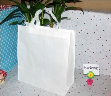 White non-woven gift pouches