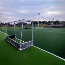 Grama artificial de campo de hóquei com padrões impressos