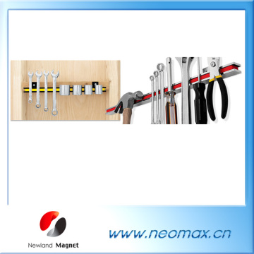 Magnetic tool holder bar for such as hammers
