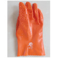 Guantes de pellet naranja para protección contra el frío.