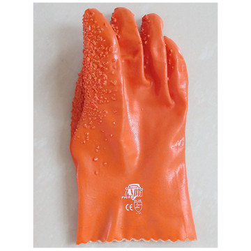 Guantes de pellet naranja para protección contra el frío.