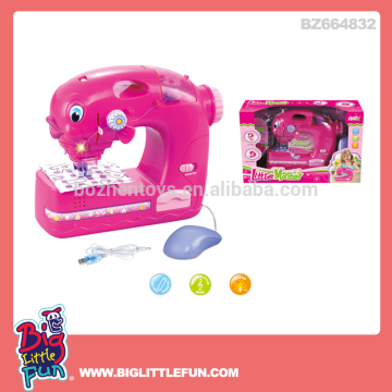 Battery operated toy sewing machine with light and USB