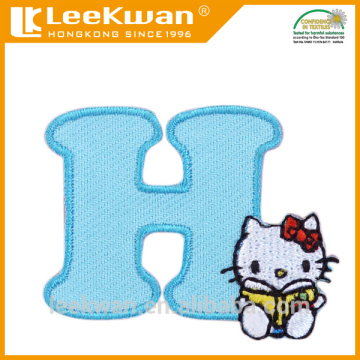 H letter embroidery applique with iron-on backing