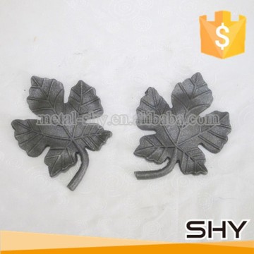 Wrought iron leaves and flowers cast steel components