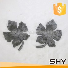 Wrought iron leaves and flowers cast steel components