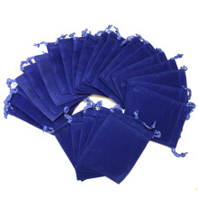 Blauw fluweel zakje met blauwe string