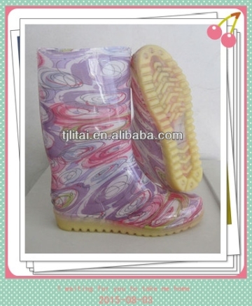 woman zebra pvc rain boots