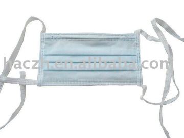 Disposable surgical facemask with tie