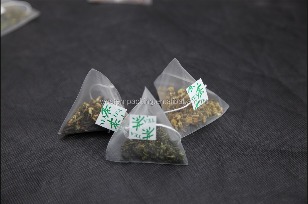 Newest triangle tea bag packaging machine with circular arc envelope