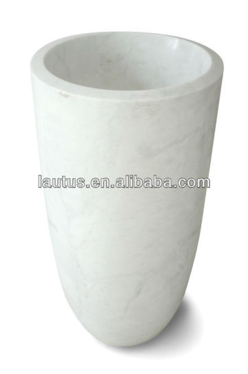 White marble free standing washbasin