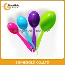 Colourful plastic measuring cup