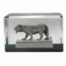 Acrylic paperweight with metal lion embedment