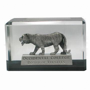 Acrylic paperweight with metal lion embedment