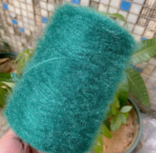 Multiple ply feather yarn