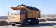 Off-highway wide-body mining dump truck