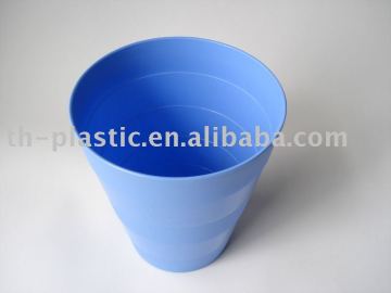 small round waste bin