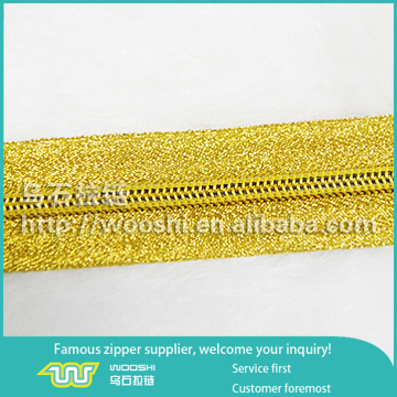 Gold silk tape nylon teeth zipper roll custom zippers