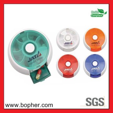 small round plastic pill box