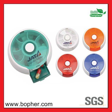 small round plastic pill box