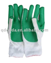 green rubber coated working glove