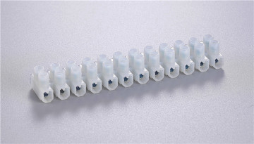 Electrical connector terminal block made of polyamide66