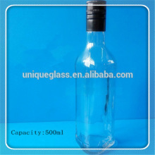 triangle shape empty glass olive oil bottle