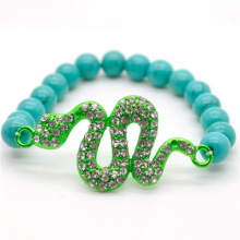 Bracelet de pierres précieuses étirées turquoise avec perles rondes de 8 mm avec morceau de serpent de Diamante