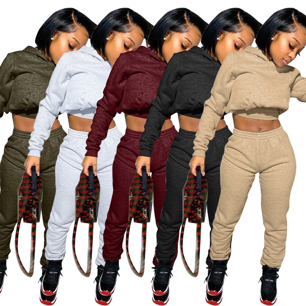 C8051 Wholesale new trendy winter two piece plus size solid color long sleeve crop top hoodie women sweatsuit set
