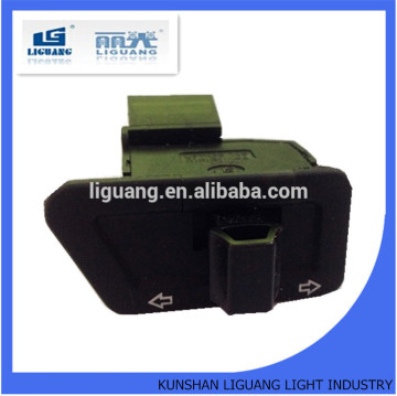 Motorcycle turn light switch button