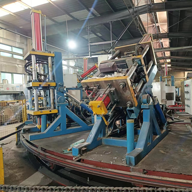 Tilt gravity casting machine