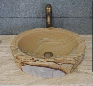 Landscaping beige sandstone basin