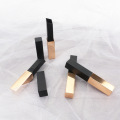 Square black and golden lipstick tube