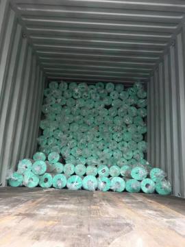 Fiberglass pads paint stop for spray booth