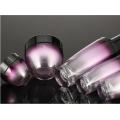 Purple gradient cosmetic glass bottles and jars