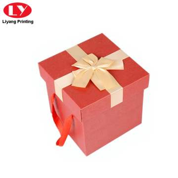 Christmas paper gift box with hanging rope