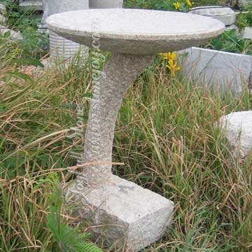 Yellow granite birdbath
