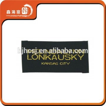 Folded custom fabric shirt labels