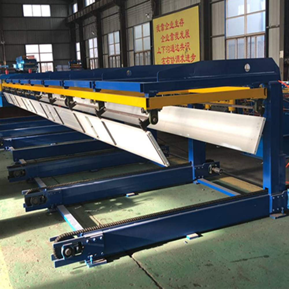 Automatic sheet stacker for roll forming machine