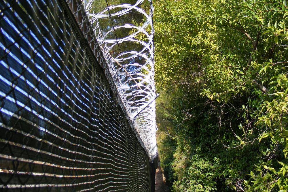 Chain-link_and_barbed_wire