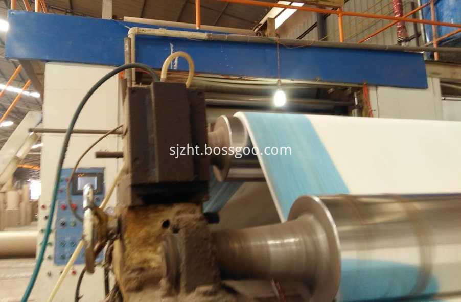 needle corrugator belt line