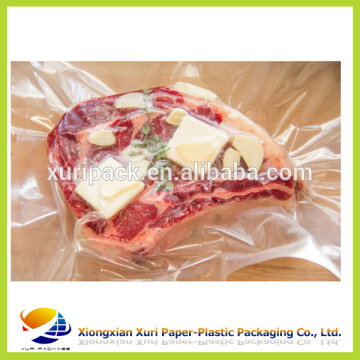 Vacuum packing bag for meat